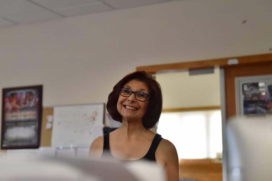 Geri Johnston smiling in the office