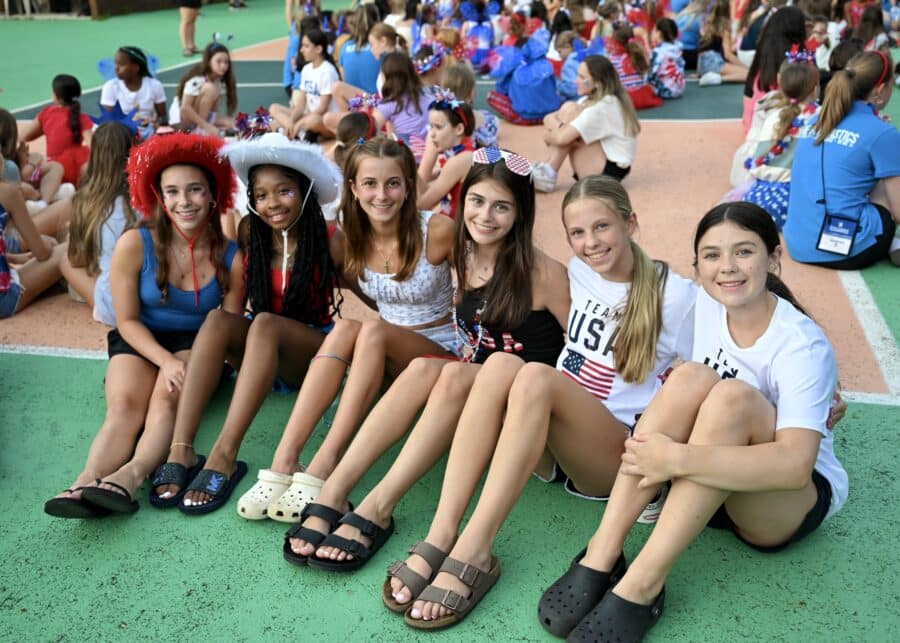 campers sitting together wearing USA themed attire.