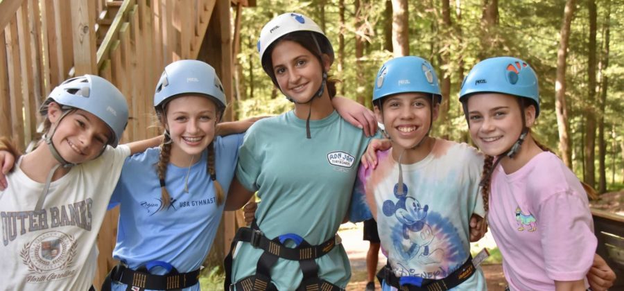 5 gymnasts in helmets