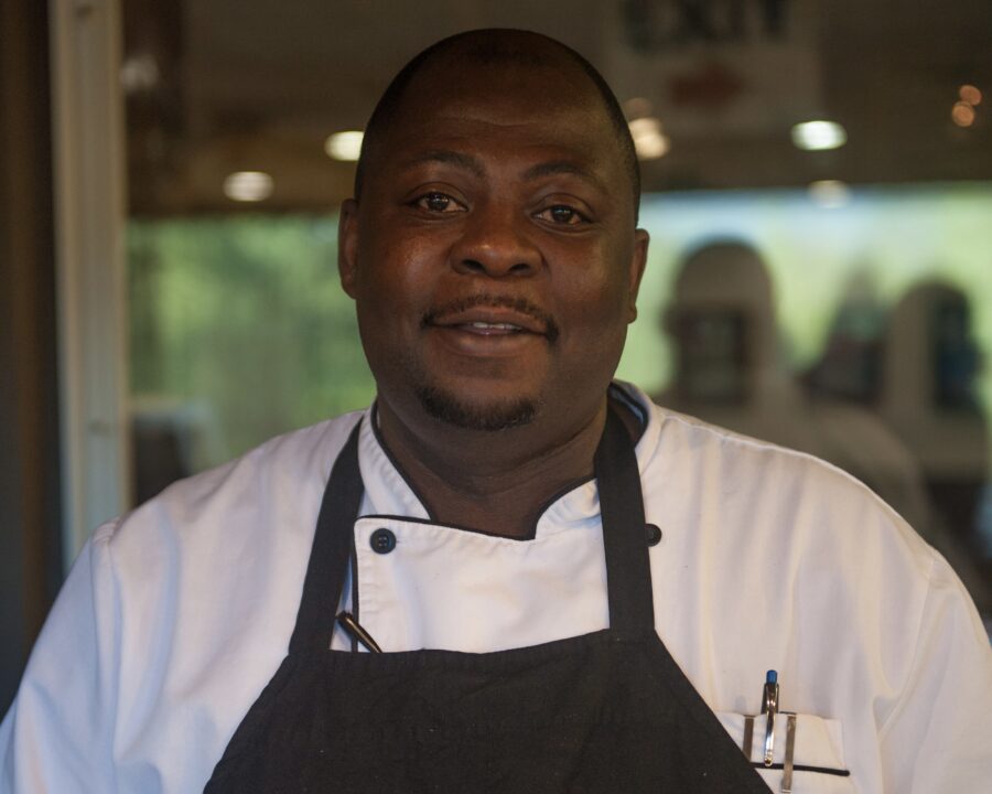 Headshot of Kab Kabu-Kubi wearing his chef's apron.