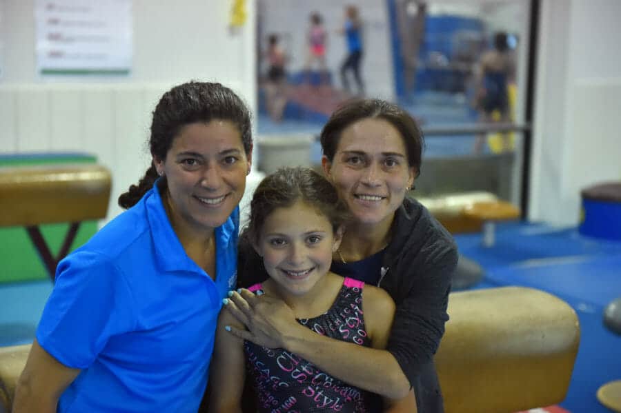 oksana posing with woman and girl