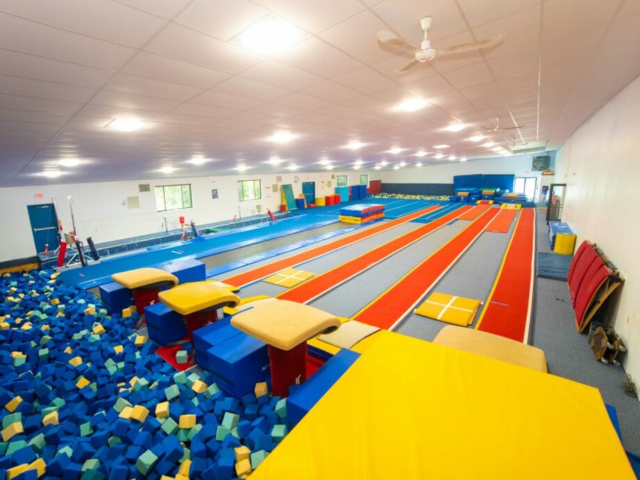 vault gym with foam pit for practicing dismounts
